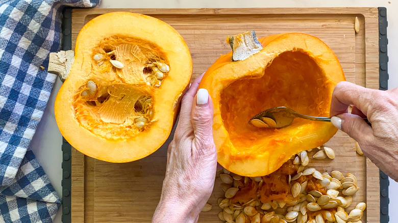 scraping seeds from pumpkin