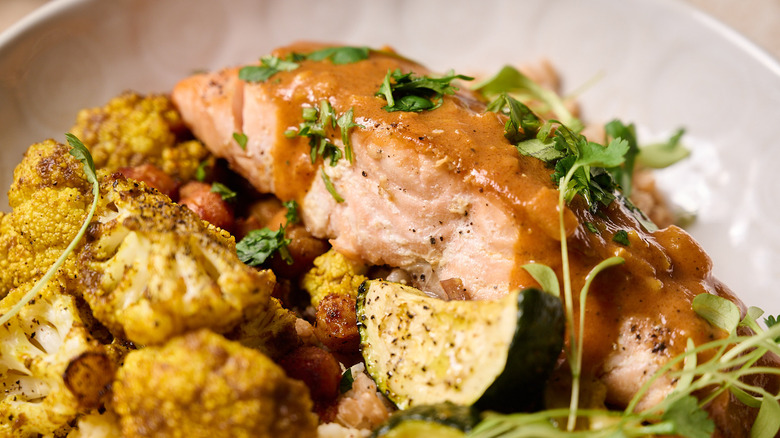 salmon in grain bowl