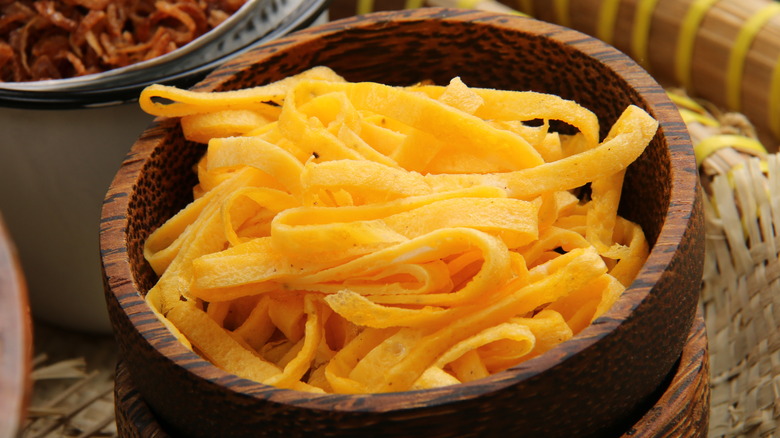 egg ribbons in a wooden bowl 