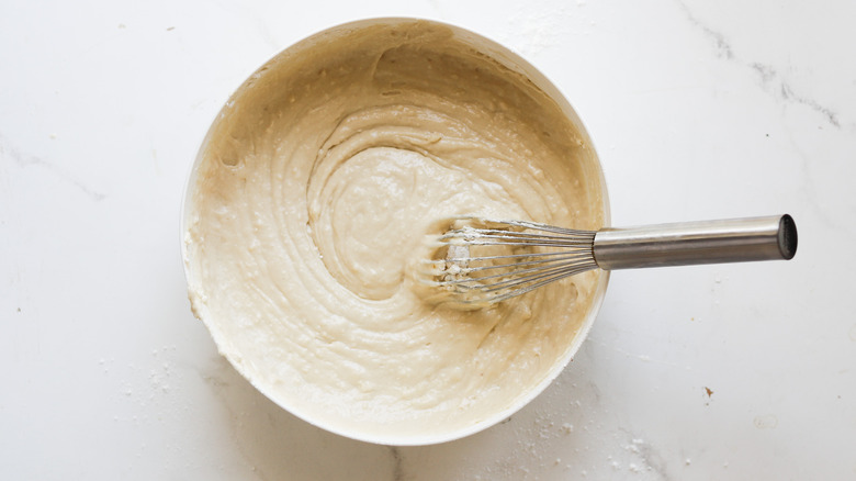 Mixed cake batter in bowl