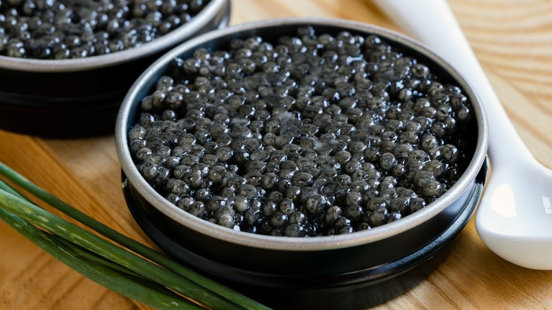 caviar tin with green onion