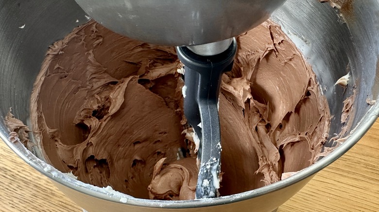 Beating chocolate cheesecake batter