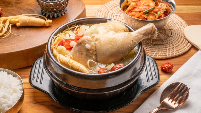 Whole chicken in broth