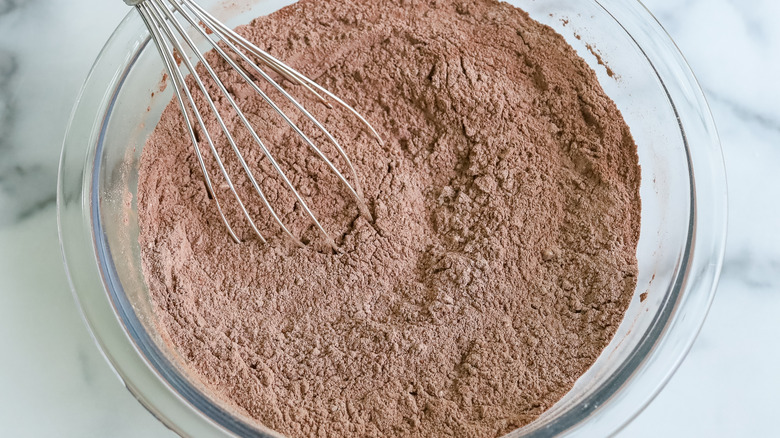 dry ingredients in a bowl with a whisk