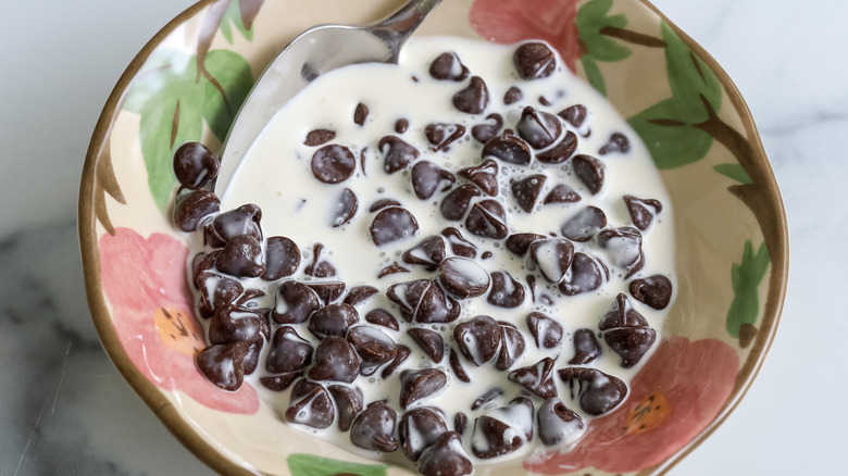 chocolate chips and heavy cream in a bowl