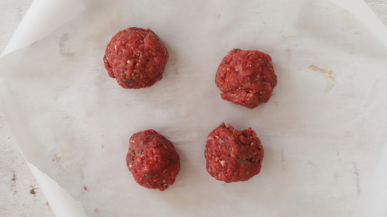 four ground beef balls