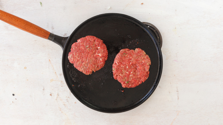 beef patties in skillet