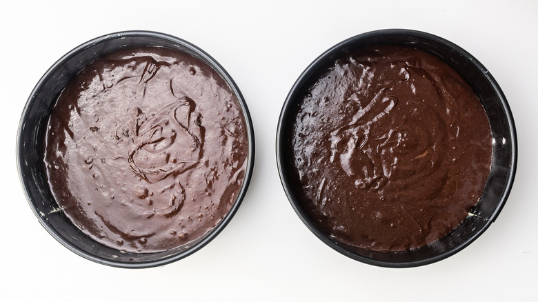 unbaked cakes in pan 
