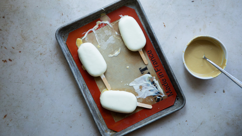 Tray with frozen chocolate pops