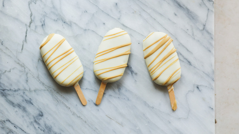 Trio of frozen pistachio popsicles