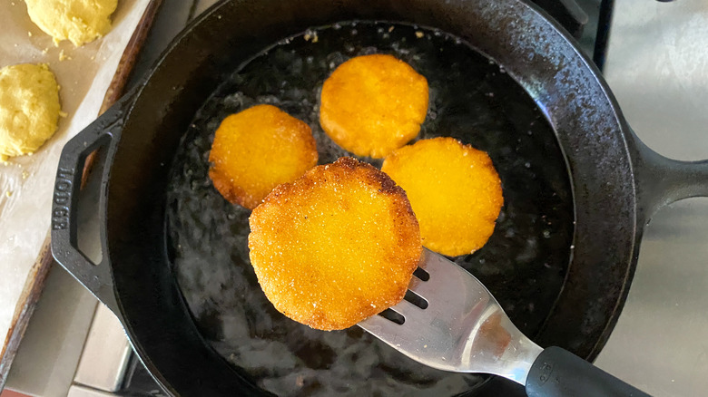 hot water cornbread in a skillet