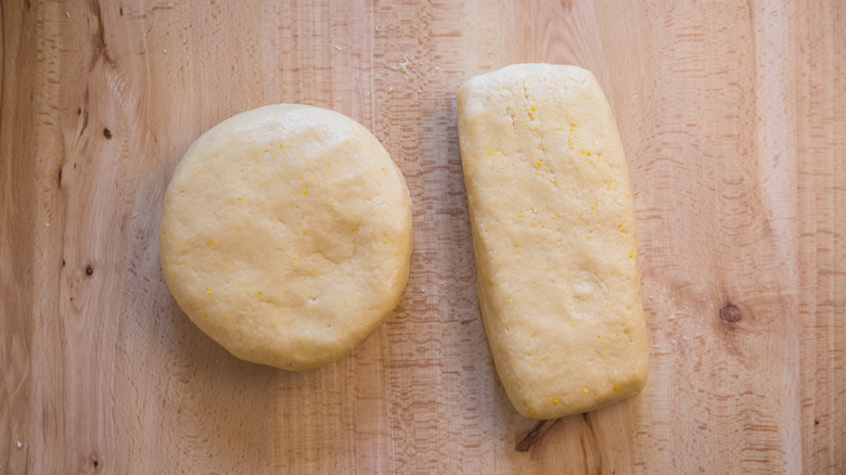 shaped dough pieces on table