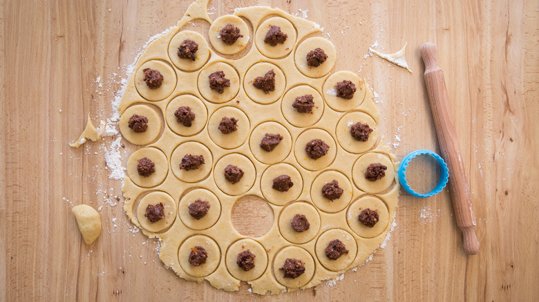 half assembled cookies on table