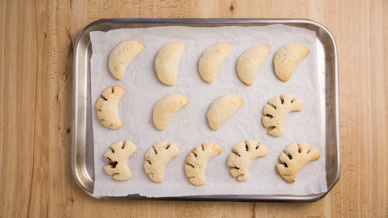 Baked cuccidati cookies on tray