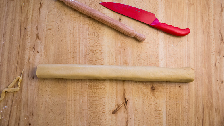 long dough tube on table