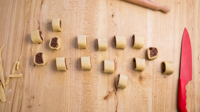 unbaked sliced cookies on table