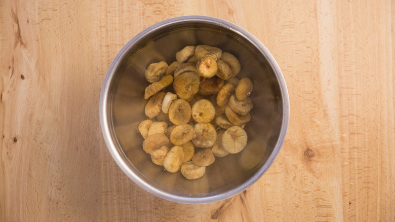 dried figs soaking in water