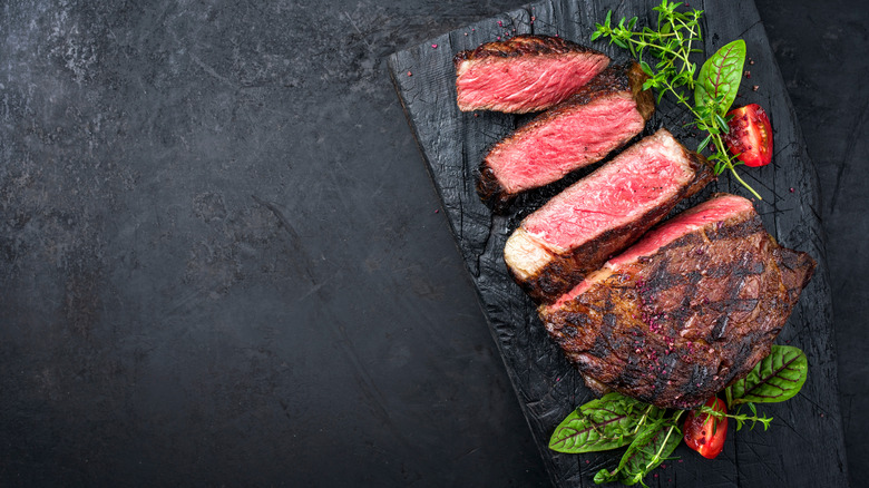 prepared sliced Delmonico steak