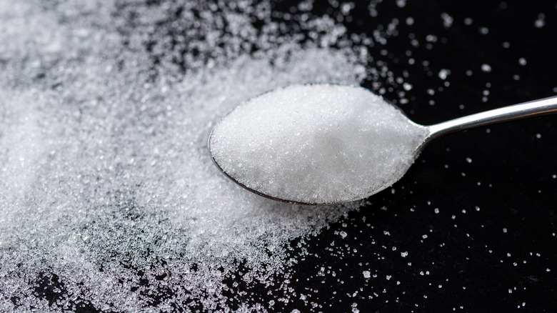 spoon with white sugar