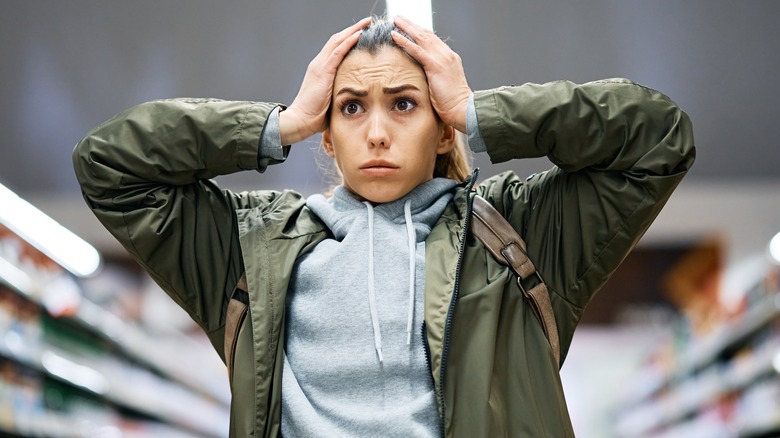 Woman worried about grocery prices