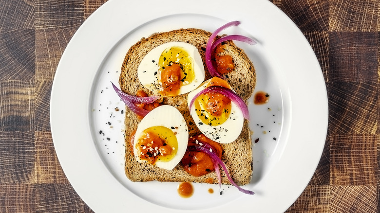 Deviled eggs and onion on toast