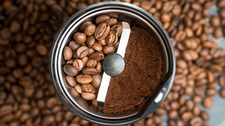 https://www.tastingtable.com/img/gallery/did-you-know-you-can-season-your-coffee-grinder/intro-1660949494.jpg