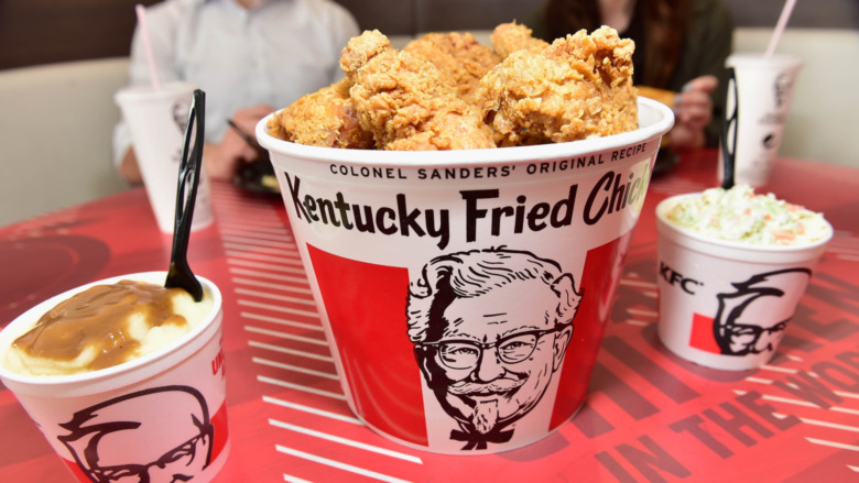 Bucket of KFC chicken with mashed potatoes and cole slaw