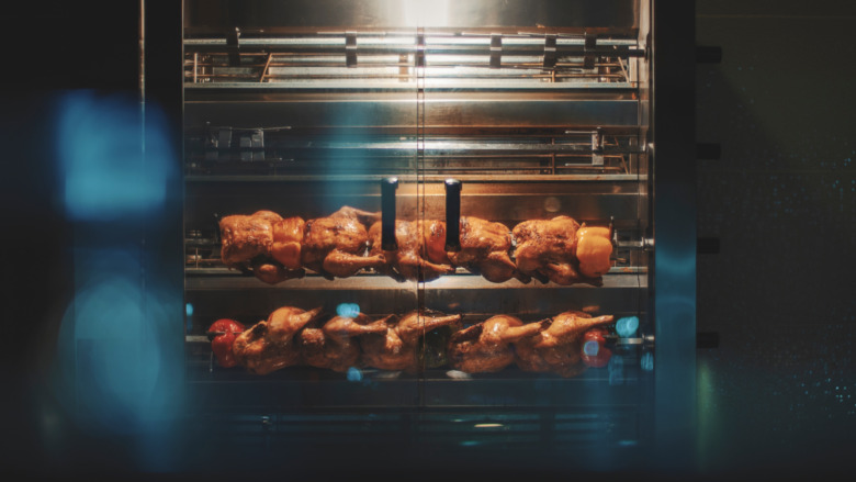 Rotisserie chicken in a commercial oven
