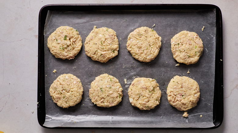 uncooked tuna patties on pan