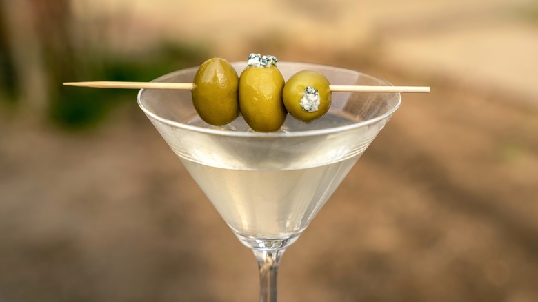 Close-up of a Dirty Martini with stuffed olives