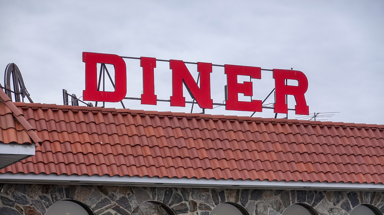 Red diner signage at restaurant 