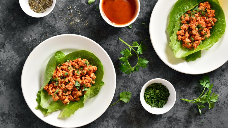 Chili beef on lettuce leaves