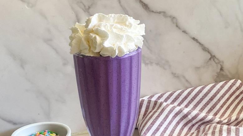 purple milkshake with whipped cream