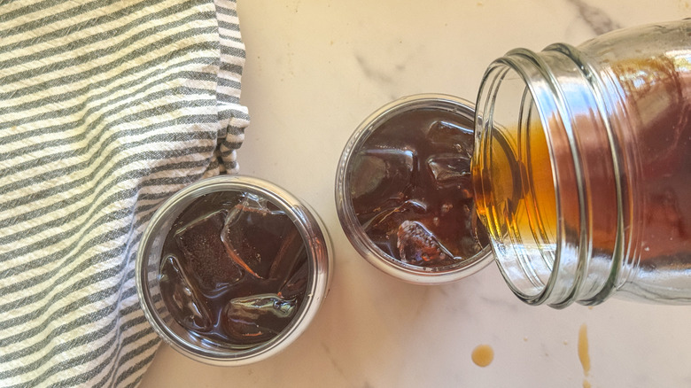 pouring coffee over ice