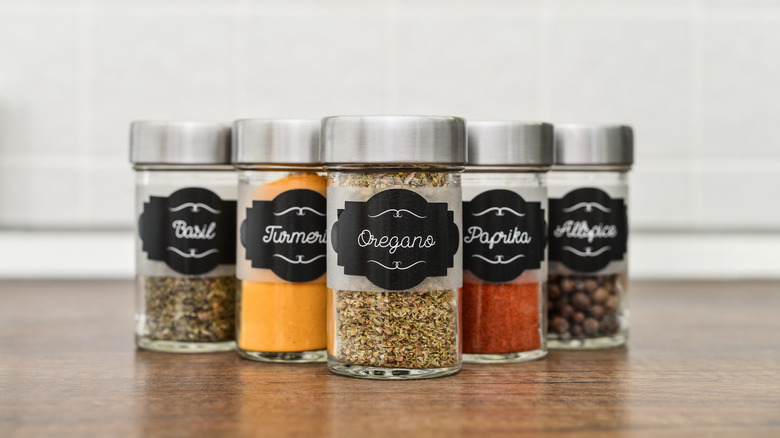 different spices in labeled jars