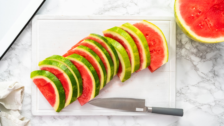 sliced watermelon on cutting board