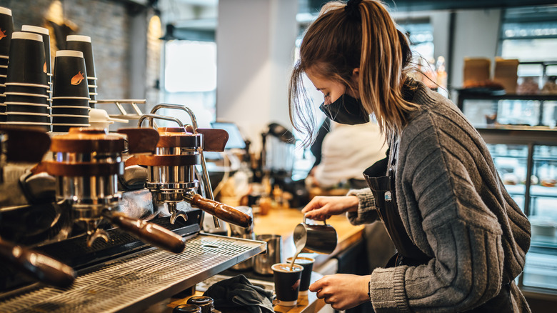 Barista making coffee.