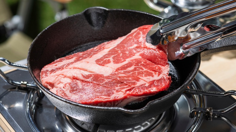 steak in cast iron skillet