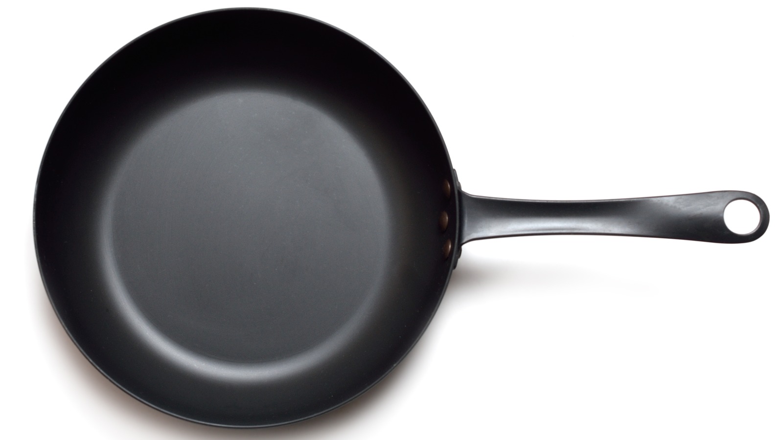 https://www.tastingtable.com/img/gallery/do-you-need-to-season-a-carbon-steel-pan/l-intro-1677079414.jpg