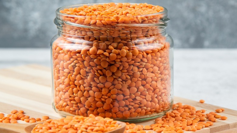 Red lentils in glass jar