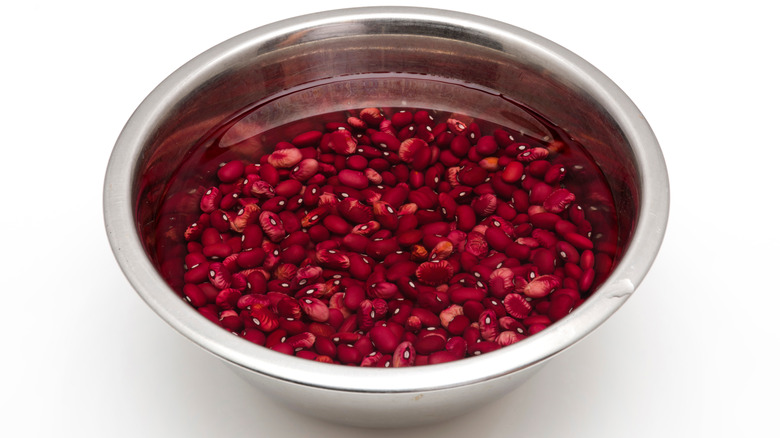 Soaking dried beans in bowl