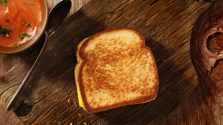 Grilled cheese on cutting board 