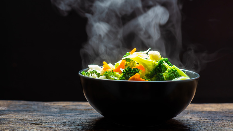 bowl of steaming vegetables