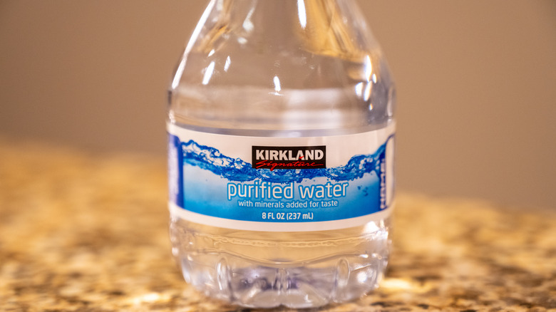 A small bottle of Kirkland Signature Purified Water