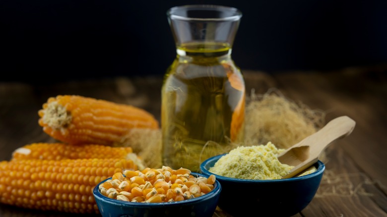 oil, corn, and cornmeal on a table