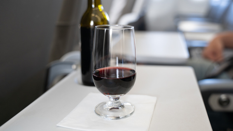 glass on red wine on an airplane