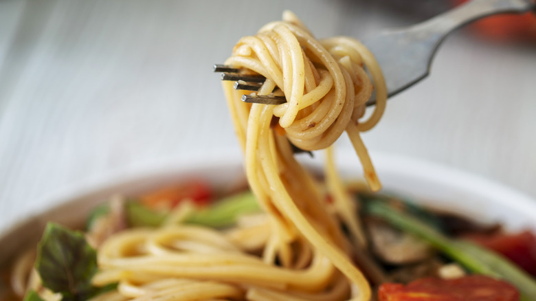 close up of spaghetti on fork