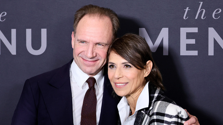 Dominique Crenn and Ralph Fiennes arm in arm