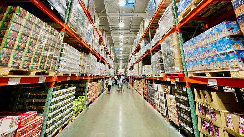 Aisle in Costco with customers shopping