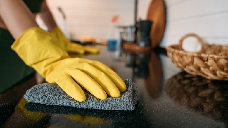 cleaning counter with rag